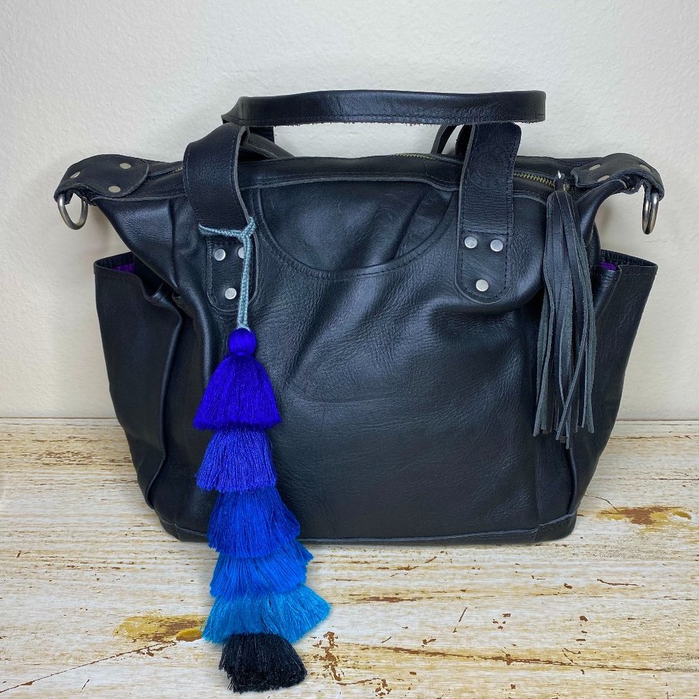 Hasta la Vista Exports Black Leather Bag with Blue Pom Poms